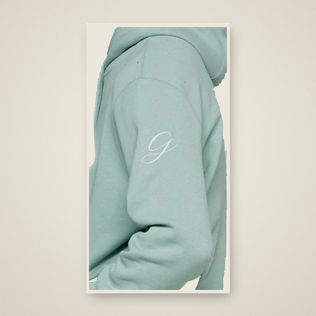 The Grounds Signature G Hoodie (In Black & Seafoam)
